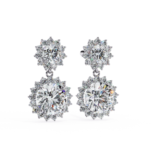 earrings with a sunflower design, a central diamond surrounded by smaller diamonds, with a diamond drop pendant.