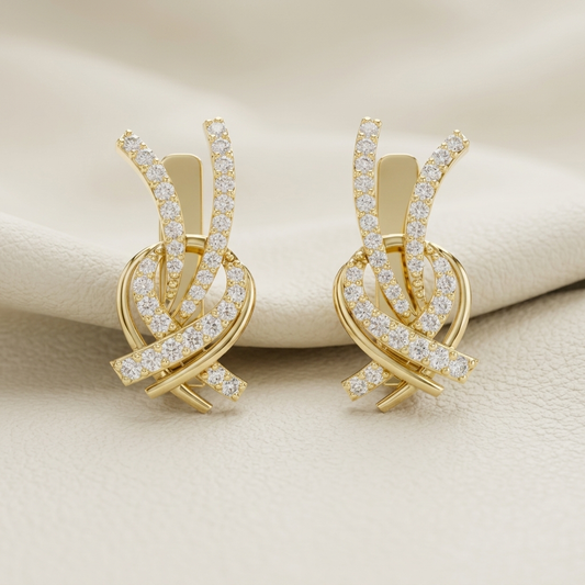 Abstract diamond ribbon stud earrings in yellow gold
Luxury yellow gold diamond ribbon earrings
Elegant pavé diamond knot earrings
Fine jewelry abstract gold earrings
Premium diamond crossover earrings
Sparkling ribbon design diamond earrings
Modern yellow gold statement earrings
Designer pavé diamond stud earrings
Contemporary abstract diamond jewelry
Luxury diamond earrings close up