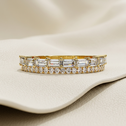 Yellow gold band with baguette and round diamond rows
Elongated baguette diamonds aligned above brilliant round stones
Elegant double row band featuring mixed diamond cuts
Geometric diamond band with horizontal baguette stone settings
Sparkling round diamond line beneath rectangular diamond accents
Fine jewelry band showcasing layered mixed cut diamond details
Structured yellow gold band with brilliant two tier stone arrangement
Radiant diamond band combining elongated and circular stone shapes
Contemporary