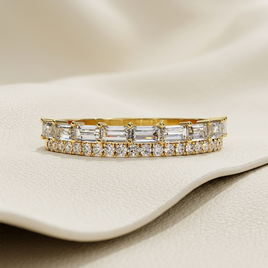 Yellow gold band with baguette and round diamond rows
Elongated baguette diamonds aligned above brilliant round stones
Elegant double row band featuring mixed diamond cuts
Geometric diamond band with horizontal baguette stone settings
Sparkling round diamond line beneath rectangular diamond accents
Fine jewelry band showcasing layered mixed cut diamond details
Structured yellow gold band with brilliant two tier stone arrangement
Radiant diamond band combining elongated and circular stone shapes
Contemporary