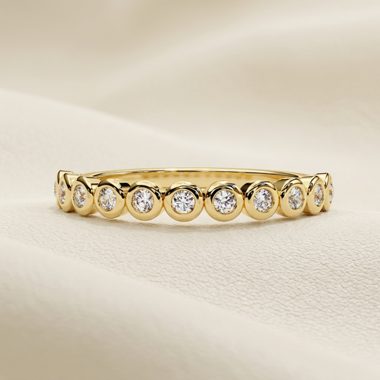 Yellow gold band with round bezel set diamond links
Brilliant round diamonds framed by polished circular gold settings
Elegant diamond band featuring repeating round gold motifs
Contemporary yellow gold band with aligned bezel diamond accents
Sparkling round cut diamonds arranged across sculpted circular links
Fine jewelry gold band showcasing rhythmic diamond station details
Polished circular frames highlighting a row of brilliant diamonds
Modern diamond band with bold rounded geometric elements
Refined ye