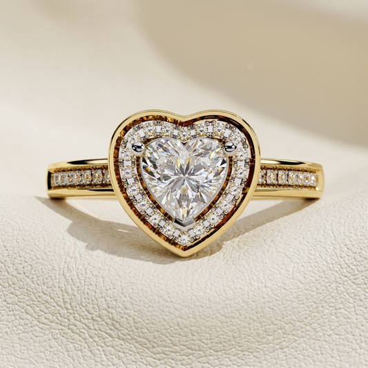 Yellow gold heart diamond ring with polished bezel frame
Brilliant heart shaped center diamond surrounded by double halo accents
Elegant yellow gold ring featuring a framed heart diamond centerpiece
Luxury heart cut diamond ring with sparkling pavé band
Bold heart diamond ring enclosed in a sculpted gold border
Fine jewelry ring with radiant heart stone and diamond halo detailing
Sophisticated heart shaped diamond ring with sleek gold outline
Dazzling pavé halo ring centered with a brilliant heart cut diamo