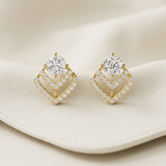 Yellow gold chevron diamond stud earrings with brilliant round solitaire diamonds.
Elegant chevron diamond stud earrings crafted in polished yellow gold.
Luxury yellow gold stud earrings featuring layered chevron lines and sparkling diamonds.
Fine jewelry chevron diamond earrings with a brilliant round center stone.
Contemporary yellow gold diamond stud earrings showcasing a modern chevron design.
Premium chevron-shaped diamond earrings accented with dazzling pavé-set diamonds.
Designer yellow gold diamond 