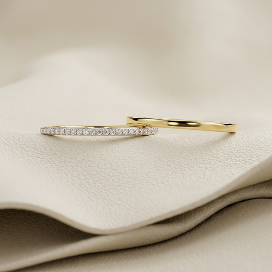 Yellow gold classic diamond wedding band ring set
Elegant matching plain and diamond wedding bands
Luxury yellow gold bridal band set with pavé diamonds
Fine jewelry classic wedding band rings for couples
Contemporary slim diamond band paired with polished gold band
Premium yellow gold wedding ring set with diamond eternity band
Designer matching wedding bands with minimalist styling
Stylish polished gold band and diamond accent band close up
Modern bridal wedding band set on soft background
Timeless yellow