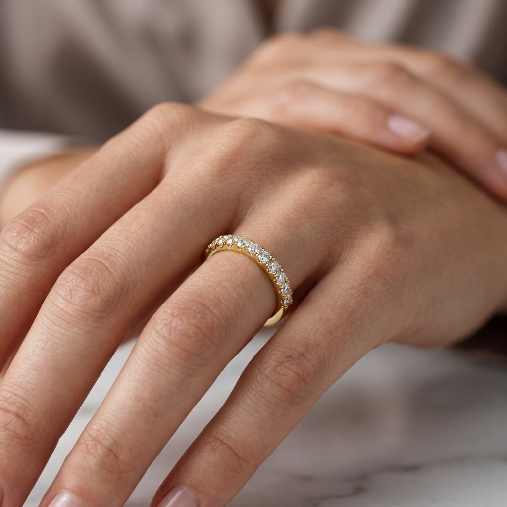 Classic gold band ring with half eternity diamond setting
Elegant gold ring with round diamonds on upper half
Minimal gold band with sparkling diamond row on finger
Fine jewelry half eternity ring with brilliant diamonds
Premium gold ring with clean diamond line design
Stylish gold band with subtle diamond accents close up
Sophisticated ring with half circle diamond detailing
Modern gold band with evenly set round diamonds
Delicate half eternity ring with refined diamond sparkle
Contemporary gold ring with 