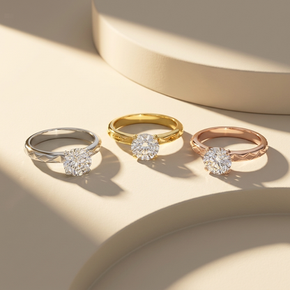 Timeless solitaire diamond rings in three elegant gold tones
Classic engagement rings with brilliant round center stones
Luxury solitaire rings in white, yellow, and rose gold finishes
Elegant rings featuring minimal and refined design
Premium jewelry set with sparkling single diamond focus
Sophisticated solitaire rings for a timeless look
Designer rings with clean band and brilliant diamond shine
High-end rings perfect for engagements or special moments
Graceful multi-tone collection with iconic solitaire 
