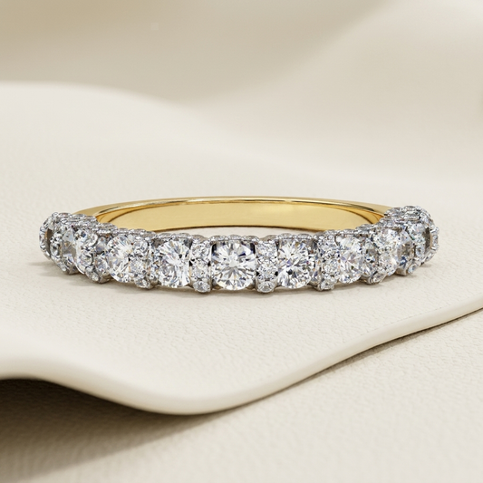 Yellow gold band with graduated round diamond arrangement
Brilliant center diamonds framed by delicate cluster stone accents
Elegant diamond band featuring alternating large and petite round stones
Sparkling gold band with layered floral inspired diamond clusters
Graduated brilliant diamonds arranged across a graceful curved setting
Fine jewelry band showcasing prominent stones with clustered side details
Radiant diamond band featuring a richly textured stone sequence
Refined yellow gold band with varied si