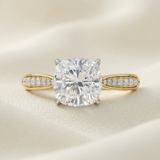 Cushion cut diamond solitaire ring in yellow gold
Cushion cut diamond ring with pavé band
Yellow gold cushion cut diamond engagement ring
Luxury cushion cut solitaire diamond ring
Fine jewelry cushion cut diamond ring
Elegant cushion cut diamond ring with pavé diamonds
Modern yellow gold cushion cut diamond ring
Premium cushion cut diamond ring for women
Handcrafted cushion cut diamond solitaire ring
Contemporary cushion cut diamond ring with pavé band