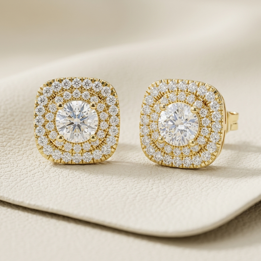 Yellow gold cushion halo diamond stud earrings with brilliant round center diamonds.
Elegant cushion-shaped halo diamond studs crafted in polished yellow gold.
Luxury yellow gold diamond stud earrings featuring a sparkling double halo design.
Fine jewelry cushion halo earrings adorned with brilliant round diamonds.
Contemporary yellow gold halo diamond stud earrings with a refined square silhouette.
Premium cushion diamond stud earrings showcasing dazzling pavé halo detailing.
Designer yellow gold halo earr