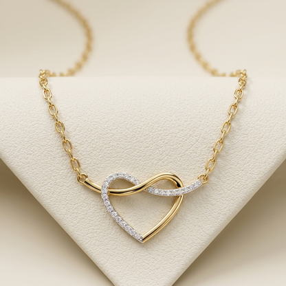 Yellow gold heart pendant with diamond infinity design
Elegant diamond heart pendant featuring flowing gold curves
Two tone infinity heart pendant with sparkling diamonds
Luxury yellow gold open heart diamond pendant close up
Delicate heart shaped pendant with sweeping diamond accent
Romantic gold and diamond infinity heart pendant design
Fine jewelry heart pendant embellished with brilliant diamonds
Contemporary intertwined heart pendant in yellow gold
Sparkling diamond curve crossing a polished gold heart