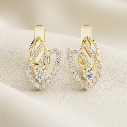 Elegant yellow gold diamond leaf drop earrings with brilliant round diamond accents.
Luxury leaf-inspired diamond earrings crafted in polished yellow gold.
Fine jewelry yellow gold drop earrings featuring an open leaf diamond design.
Contemporary diamond leaf earrings with sparkling pavé detailing in yellow gold.
Designer yellow gold earrings showcasing graceful leaf motifs and brilliant diamonds.
Premium yellow gold diamond drop earrings with an elegant nature-inspired style.
Handcrafted leaf-shaped diamon