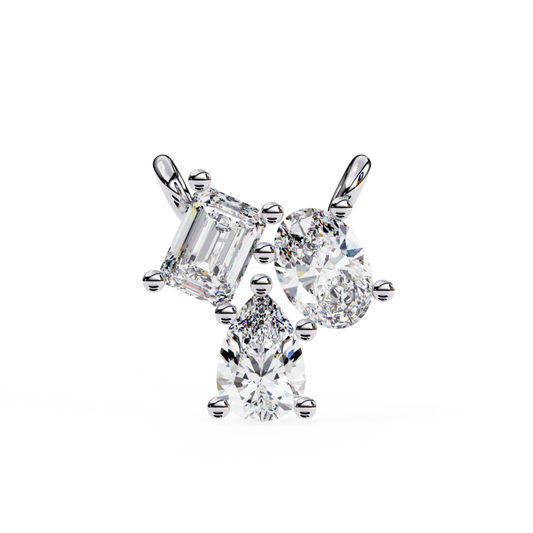 Three diamonds in different shapes set in a white gold earring.
