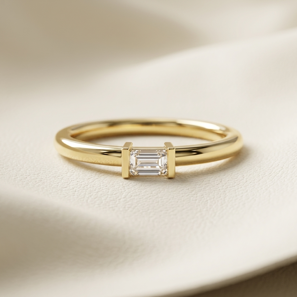 Emerald cut solitaire diamond ring in yellow gold
Minimalist emerald cut diamond engagement ring
Yellow gold emerald cut bezel style diamond ring
Elegant emerald cut solitaire ring close-up
Fine jewelry emerald cut diamond ring for women
Classic emerald cut diamond engagement ring
Modern yellow gold emerald cut solitaire ring
Delicate emerald cut diamond ring product photo
Luxury emerald cut diamond ring with slim band
Timeless emerald cut solitaire engagement ring