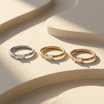 Emerald cut diamond rings in three gold colors
White yellow and rose gold emerald cut ring collection
Emerald cut solitaire rings in multiple metal finishes
Luxury emerald cut diamond ring collection display
Minimalist emerald cut diamond ring trio
Fine jewelry emerald cut ring collection
Three metal emerald cut engagement rings
Elegant emerald cut diamond ring comparison
Modern emerald cut solitaire ring collection
Premium emerald cut diamond rings showcase