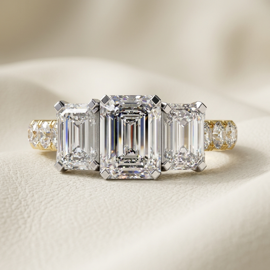 Yellow gold three stone emerald cut diamond ring
Luxury three stone emerald cut diamond engagement ring
Elegant emerald cut diamond ring with tapered side stones
Fine jewelry three stone emerald cut diamond ring close up
Sparkling yellow gold emerald cut diamond ring
Premium three stone emerald cut engagement ring for women
Designer emerald cut diamond ring with side diamonds
Modern yellow gold three stone diamond ring
Timeless emerald cut three stone diamond ring
Classic yellow gold emerald cut diamond