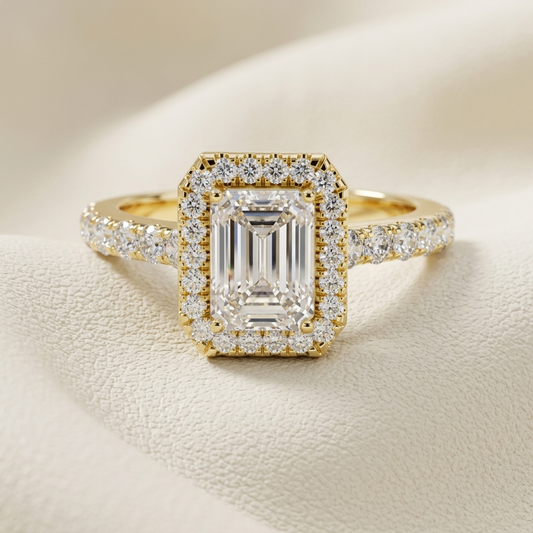 Emerald halo diamond ring in yellow gold.
Yellow gold emerald halo engagement ring.
Emerald cut diamond halo ring.
Emerald halo ring with pavé band.
Elegant emerald cut halo ring.
Gold emerald diamond engagement ring.
Luxury emerald halo diamond ring.
Emerald cut ring with diamond halo.
Classic emerald halo solitaire ring.
Emerald cut halo ring in gold.