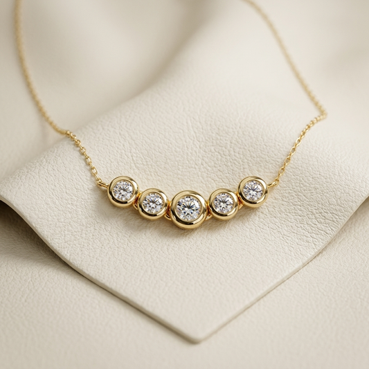 Yellow gold five stone bezel diamond necklace
Luxury bezel set five diamond necklace in yellow gold
Elegant five stone round diamond necklace with gold chain
Fine jewelry bezel set diamond station necklace close up
Sparkling five stone diamond necklace in yellow gold
Premium bezel set round diamond necklace for women
Designer five diamond bezel necklace with brilliant round stones
Modern yellow gold five stone diamond necklace
Timeless bezel set five diamond necklace with delicate chain
Classic yellow gold 
