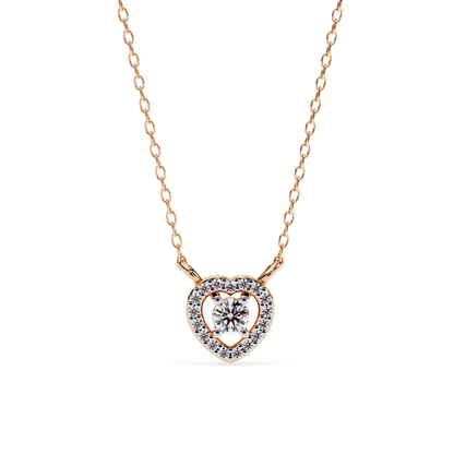 Rose gold heart pendant with a floating round center diamond
Open heart necklace featuring a pavé diamond halo design
Elegant heart pendant showcasing a brilliant solitaire within a diamond frame
Fine rose gold necklace with a sparkling open heart diamond motif
Delicate heart shaped pendant accented by a luminous pavé border
Brilliant round diamond pendant suspended inside an open heart setting
Romantic rose gold pendant with a halo heart and floating center stone
Contemporary heart necklace featuring polis