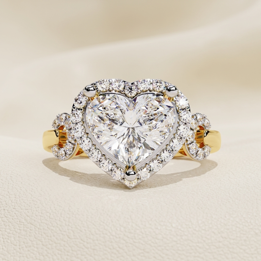 Yellow gold heart diamond ring with floral side accents
Brilliant heart shaped center diamond framed by a sparkling halo
Elegant heart diamond ring featuring delicate flower inspired details
Luxury halo ring with radiant heart cut diamond centerpiece
Intricate yellow gold ring with heart diamond and clustered side stones
Fine jewelry heart ring adorned with shimmering diamond floral motifs
Dazzling heart cut diamond surrounded by a brilliant pavé border
Romantic diamond ring with ornate side accents and hea