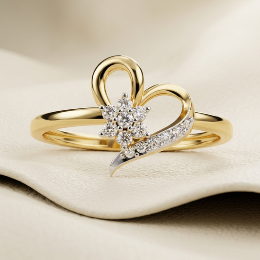 Yellow gold heart ring with floral diamond cluster centerpiece
Sculpted open heart design featuring sparkling flower shaped diamonds
Elegant gold ring with sweeping pavé diamond heart curve
Diamond blossom nestled inside a polished heart silhouette
Graceful heart motif ring accented with clustered round diamonds
Artistic yellow gold ring combining floral and love inspired details
Sparkling diamond flower framed by flowing open heart curves
Delicate pavé sweep enhancing a sculptural gold heart design
Refined