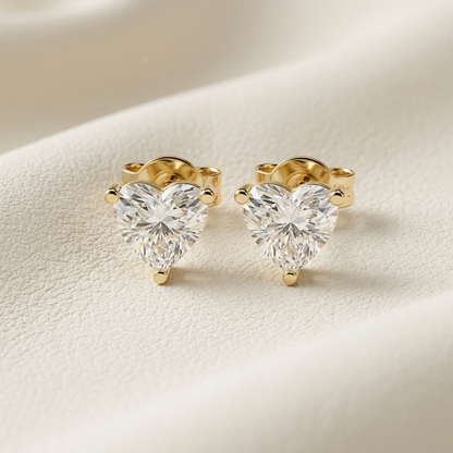 Yellow gold heart diamond stud earrings featuring brilliant heart-shaped solitaire diamonds.
Elegant heart-shaped diamond stud earrings crafted in polished yellow gold.
Luxury yellow gold heart diamond earrings with sparkling solitaire diamonds.
Fine jewelry heart diamond stud earrings in a classic three-prong yellow gold setting.
Contemporary heart-shaped diamond earrings showcasing exceptional brilliance.
Premium yellow gold heart solitaire diamond stud earrings with timeless elegance.
Designer heart diam