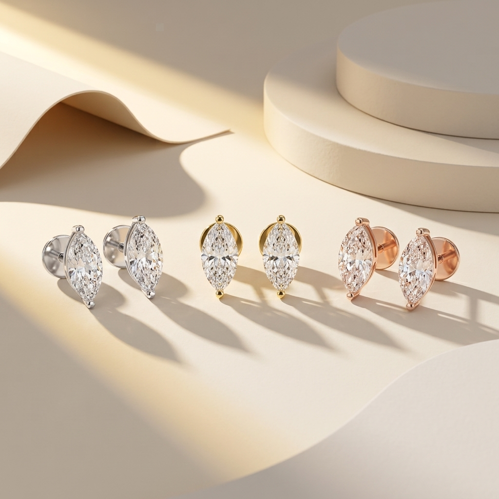 Marquise diamond stud earrings available in white, yellow, and rose gold finishes.
Luxury marquise cut diamond stud earrings crafted in white, yellow, and rose gold.
Elegant marquise solitaire diamond earrings showcased in three premium gold tones.
Fine jewelry marquise diamond studs featuring brilliant marquise-cut diamonds in three gold finishes.
Contemporary marquise cut diamond earrings displayed in white, yellow, and rose gold.
Premium marquise solitaire diamond stud earrings designed in three luxuriou