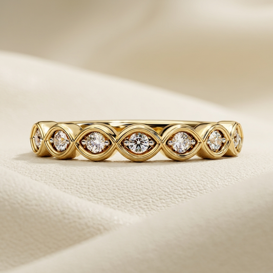 Yellow gold band with repeating marquise shaped diamond links
Brilliant round diamonds framed by sculpted eye shaped gold motifs
Elegant gold band featuring continuous intertwined diamond settings
Polished yellow gold band with rhythmic oval diamond accents
Contemporary diamond band showcasing layered curved link details
Round cut diamonds centered inside pointed gold loop frames
Fine jewelry band with symmetrical interlocking diamond motifs
Sculptural gold band featuring repeating leaf inspired stone setti