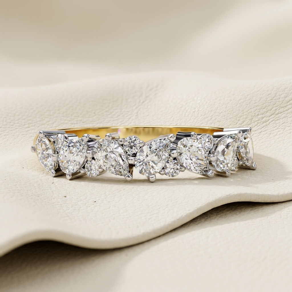 Yellow gold mixed cut diamond band with marquise pear and round diamonds
Luxury mixed shape diamond band in yellow gold
Elegant diamond band featuring pear marquise and round diamonds
Fine jewelry mixed cut diamond band close up
Premium yellow gold diamond band with multi shape diamonds
Sparkling mixed cut diamond band for women
Designer diamond band with pear marquise and round cut stones
Modern yellow gold mixed diamond band
Timeless multi shape diamond band with brilliant diamonds
Classic yellow gold dia