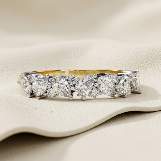 Yellow gold mixed cut diamond band with marquise pear and round diamonds
Luxury mixed shape diamond band in yellow gold
Elegant diamond band featuring pear marquise and round diamonds
Fine jewelry mixed cut diamond band close up
Premium yellow gold diamond band with multi shape diamonds
Sparkling mixed cut diamond band for women
Designer diamond band with pear marquise and round cut stones
Modern yellow gold mixed diamond band
Timeless multi shape diamond band with brilliant diamonds
Classic yellow gold dia
