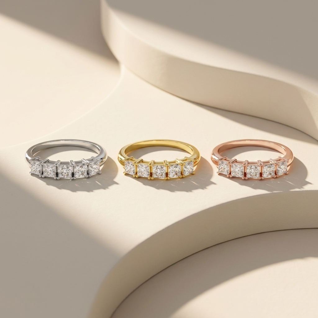 Princess cut diamond rings in white yellow and rose gold
Elegant trio rings with square diamonds in different metals
Luxury diamond band rings in three gold color variations
Fine jewelry rings with princess cut diamonds display
Modern diamond rings in white yellow and rose finishes
Premium band rings with geometric diamond settings
Stylish trio of diamond rings with clean square cuts
Contemporary rings collection with multi metal tones
High end diamond rings with structured stone layout
Minimal luxury rings