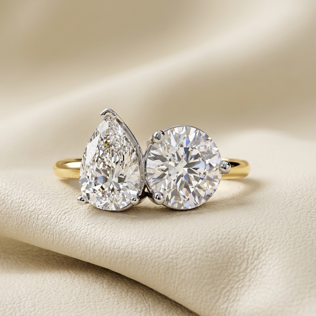 Pear And Round Diamond Toi Et Moi Engagement Ring
Modern Pear And Round Diamond Engagement Ring
Open Bypass Pear Diamond Ring With Round Stone
Dual Stone Diamond Bridal Ring With Gold Band
Pear Cut And Round Cut Diamond Engagement Ring
Contemporary Two Stone Diamond Ring For Women
Asymmetrical Pear And Round Diamond Bridal Ring
Mixed Shape Diamond Solitaire Ring With Gold Band
Designer Pear And Round Diamond Statement Ring
Elegant Toi Et Moi Diamond Engagement Ring Design