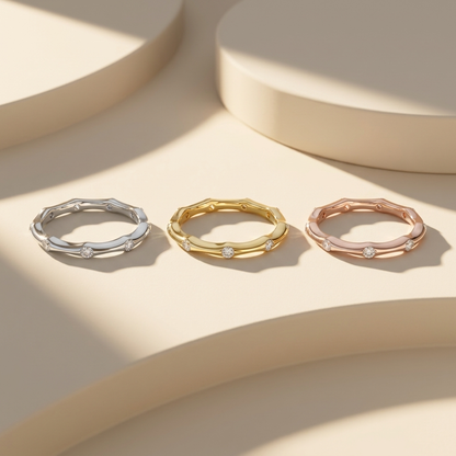 Bezel set diamond rings in white yellow and rose gold
Elegant trio eternity rings with spaced diamond accents
Luxury gold rings with bezel set diamonds in three tones
Fine jewelry eternity bands with minimal diamond layout
Modern rings with floating diamond settings in mixed metals
Premium trio rings with subtle bezel diamond design
Stylish eternity bands with soft wave shape and diamonds
Contemporary rings collection with delicate diamond placement
High end gold rings with evenly spaced diamond accents
Min
