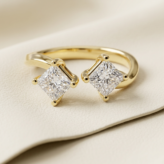 Modern open ring with twin princess cut diamonds
Elegant yellow gold bypass ring with two square diamonds
Minimalist gold ring featuring dual diamond setting
Fine jewelry open band with symmetrical diamond design
Contemporary ring with floating princess cut diamonds
Stylish gold ring with sleek open-ended diamond layout
Premium bypass ring with balanced diamond placement
Close-up of modern gold ring with twin diamond focus
Sophisticated open band ring with clean geometric style
Luxury gold ring with double 