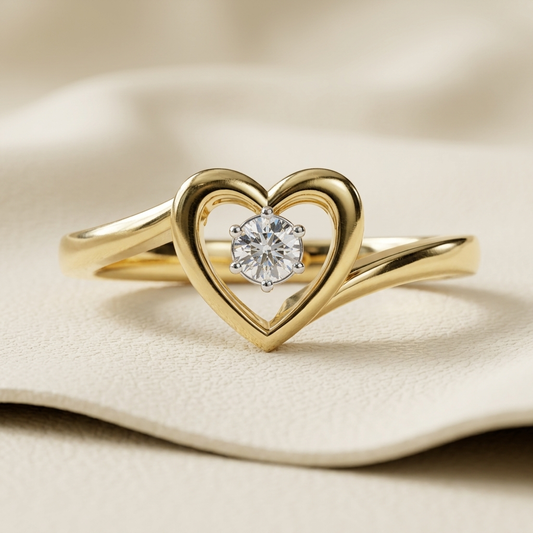 Yellow gold open heart ring with floating round solitaire diamond
Brilliant round diamond suspended inside a polished heart frame
Elegant heart motif ring featuring a six prong center diamond
Sculpted yellow gold heart ring with graceful crossover band
Radiant solitaire diamond centered within an openwork heart silhouette
Minimal love inspired ring with a luminous round diamond centerpiece
Polished heart shaped setting paired with a flowing gold band
Delicate diamond ring showcasing an airy heart frame desi