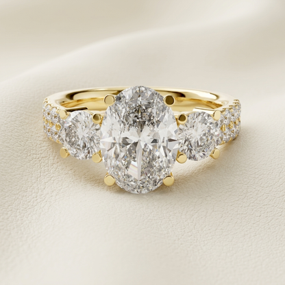 Oval diamond gold ring close up
Luxury oval diamond ring design
Gold ring with large oval diamond
Elegant three stone diamond ring
Premium diamond ring close view
Classic oval cut diamond ring
Fine jewelry gold diamond ring
Sparkling oval diamond ring on band
Beautiful luxury engagement ring
High quality oval diamond ring