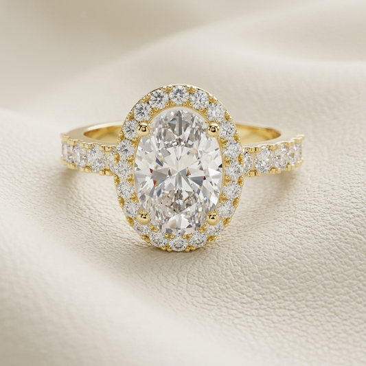 Oval halo diamond ring in yellow gold.
Yellow gold oval halo ring.
Oval diamond halo engagement ring.
Oval solitaire halo diamond ring.
Classic oval halo diamond ring.
Pavé oval halo gold ring.
Elegant oval diamond ring.
Oval cut diamond halo ring.
Luxury oval halo engagement ring.
Gold oval diamond halo ring.