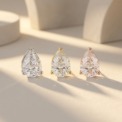 Pear diamond stud earrings available in white, yellow, and rose gold finishes.
Luxury pear-shaped diamond stud earrings crafted in white, yellow, and rose gold.
Elegant pear solitaire diamond earrings showcased in three premium gold tones.
Fine jewelry pear diamond studs featuring brilliant pear-cut diamonds in three gold finishes.
Contemporary pear-shaped diamond earrings displayed in white, yellow, and rose gold.
Premium pear solitaire diamond stud earrings designed in three luxurious gold colors.
Designe