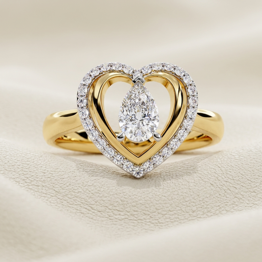Yellow gold heart ring with suspended pear shaped center diamond
Pear cut diamond framed by a sparkling open heart halo
Elegant diamond ring featuring a floating teardrop stone centerpiece
Pavé diamond heart outline surrounding a brilliant pear cut gem
Sculpted yellow gold ring with nested heart curves and center diamond
Radiant pear diamond displayed inside an openwork heart setting
Fine jewelry heart ring with shimmering diamond border and gold interior
Graceful teardrop diamond ring accented by a brillia