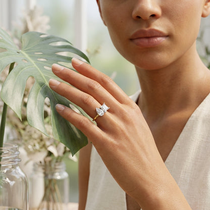 Model wearing pear and princess cut diamond ring
Pear and princess diamond ring on hand with leaf
Two stone pear and princess diamond ring lifestyle image
Luxury pear and princess diamond ring in yellow gold
Fine jewelry pear and princess cut diamond ring
Elegant pear and princess diamond ring close up
Modern two stone diamond ring on model hand
Premium pear and princess diamond ring with natural styling
Hand wearing pear and princess cut diamond ring
Contemporary pear and princess diamond ring with botanic
