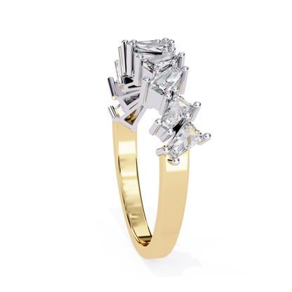 Angled side view of curved band with princess cut diamonds in yellow gold