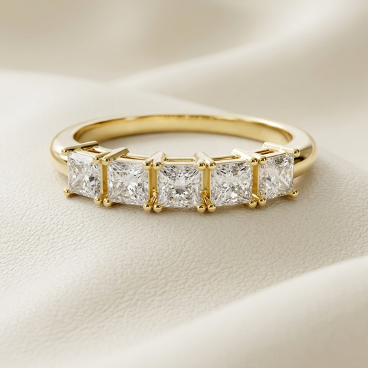 Gold ring with princess cut diamonds in a row setting
Elegant eternity ring with square cut diamonds close up
Luxury gold band with multiple princess cut diamonds
Fine jewelry ring with aligned square diamonds design
Premium eternity band with brilliant princess cut stones
Modern gold ring featuring continuous diamond setting
Stylish diamond ring with geometric stone arrangement
High end gold band with sparkling square diamonds
Minimal elegant ring with princess cut diamond row
Sophisticated eternity ring w