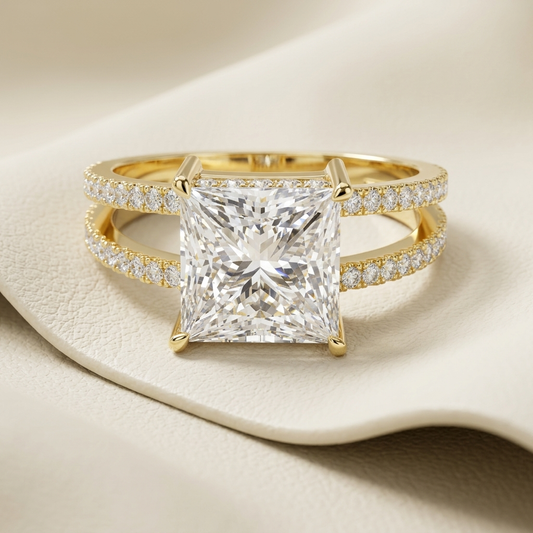 Princess cut diamond engagement ring with pave split gold band
Yellow gold ring featuring a large square princess cut diamond
Luxury split shank engagement ring with brilliant diamond center
Square cut diamond ring with double pave yellow gold bands
Elegant princess diamond solitaire ring in polished yellow gold
Statement engagement ring with sparkling split shank diamond setting
Fine jewelry gold ring featuring a large princess cut center stone
Modern diamond engagement ring with four prong square stone se