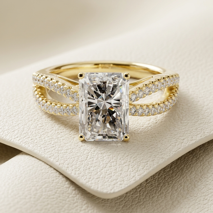 Radiant cut diamond ring with split pavé gold bands
Elegant gold ring with rectangular diamond center stone
Luxury engagement ring with double diamond band design
Fine jewelry ring with radiant cut diamond close up
Premium gold ring with layered pavé diamond bands
Stylish engagement ring with bold rectangular diamond
Sophisticated ring with split band and diamond detailing
Modern gold ring with radiant diamond centerpiece
High end engagement ring with dual pavé band style
Classic gold ring with radiant cut 