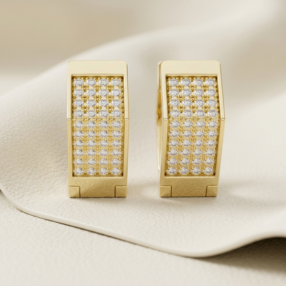 Yellow gold rectangle hoop earrings featuring brilliant pavé-set diamonds.
Elegant rectangular diamond hoop earrings crafted in polished yellow gold.
Luxury yellow gold hoop earrings with a sleek rectangular diamond design.
Fine jewelry rectangle hoop earrings adorned with sparkling round diamonds.
Contemporary yellow gold diamond hoop earrings with a bold geometric silhouette.
Premium rectangular gold hoop earrings showcasing multiple rows of brilliant diamonds.
Designer yellow gold rectangle earrings with