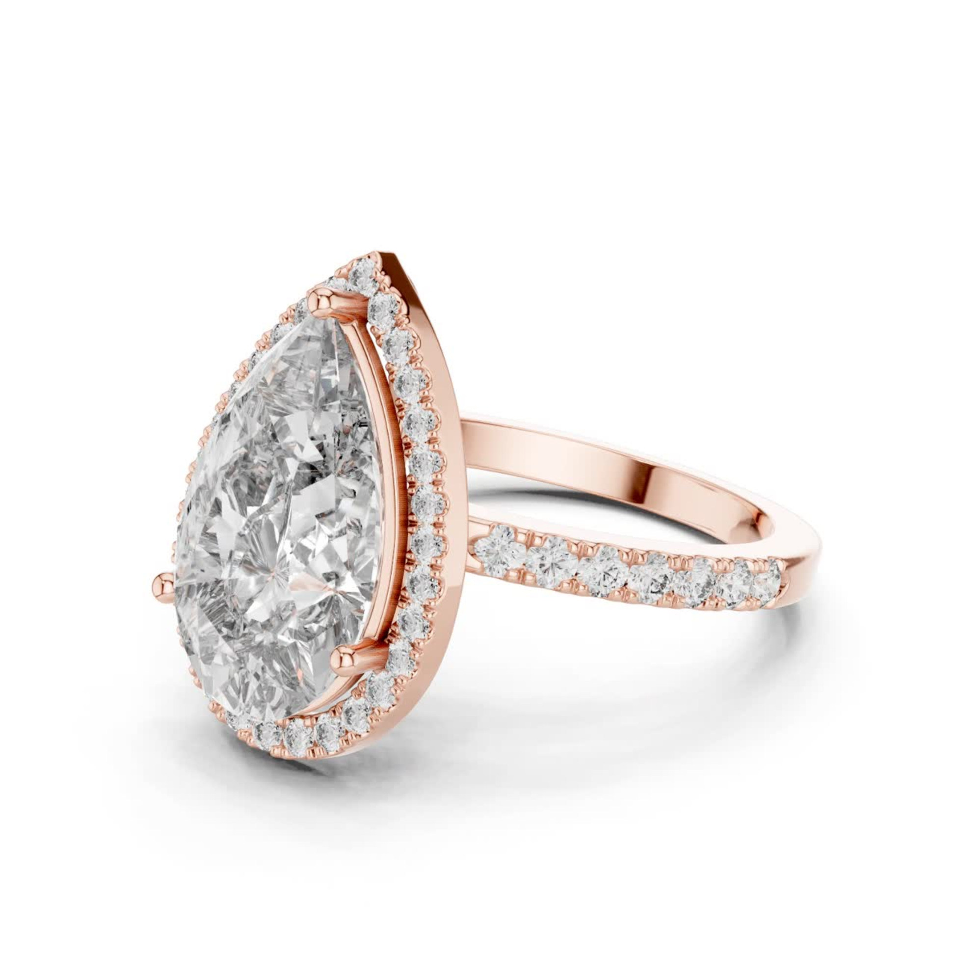 Rose gold pear diamond halo ring angled view
Angled view of rose gold pear diamond halo ring
Rose gold pear cut diamond halo engagement ring
Pear solitaire diamond ring with halo setting
Rose gold pear diamond ring with pave band
Pear shaped halo ring in rose gold
Rose gold pear lab grown diamond ring
Rose gold pear halo ring with pave band
Angled rose gold pear engagement ring
Rose gold pear halo diamond ring