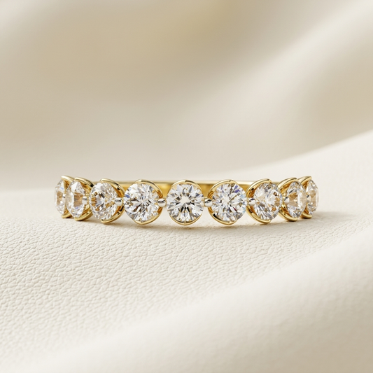 Yellow gold round bezel diamond eternity band
Luxury bezel set round diamond eternity band in yellow gold
Elegant full eternity band with round brilliant diamonds
Fine jewelry round bezel diamond band close up
Sparkling yellow gold eternity band with bezel set diamonds
Premium round diamond eternity band for women
Designer bezel set diamond eternity band in yellow gold
Modern full diamond eternity band with round brilliant stones
Timeless yellow gold bezel diamond eternity band
Classic round bezel set diamo