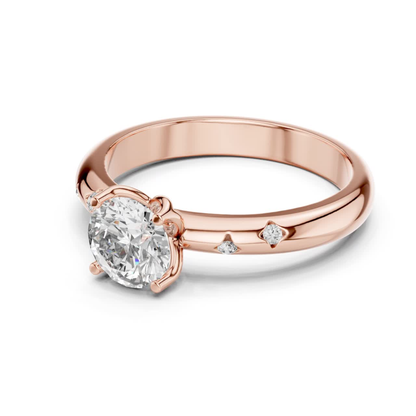 Rose gold round diamond solitaire ring side view
Side view round cut diamond ring in rose gold
Rose gold solitaire ring with accent diamonds
Round diamond engagement ring side profile
Four prong round diamond ring in rose gold
Rose gold ring with scattered diamond accents
Elegant round diamond solitaire ring side angle
Fine jewelry rose gold diamond ring close up
Polished rose gold ring with round diamond
Rose gold solitaire ring with accent stone band