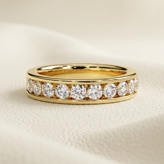 Yellow gold band with brilliant round diamond channel row
Closely aligned round diamonds framed by smooth polished gold edges
Elegant gold band featuring a continuous brilliant stone gallery
Radiant diamond band with large circular stones in a sleek channel
Refined yellow gold band showcasing uniform round cut diamonds
Fine jewelry band with a bold single row diamond arrangement
Brilliant stones displayed between polished gold border rails
Classic diamond band featuring evenly spaced luminous round stones
S