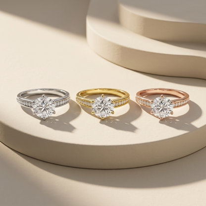 Round pavé diamonds in three gold tones.
Round diamond pavé collection.
White, yellow, and rose gold pavé settings.
Three-tone round diamond solitaires.
Classic pavé diamond designs.
Luxury round pavé diamonds.
Round diamonds in three finishes.
Elegant pavé solitaire trio.
Round solitaire with pavé bands.
Round diamond pavé settings.