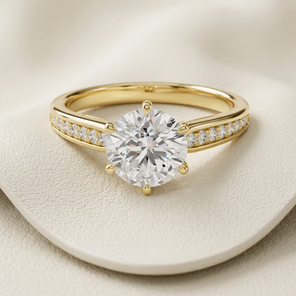 Round diamond pavé solitaire.
Yellow gold round diamond.
Round solitaire with pavé band.
Pavé set diamond solitaire.
Classic round diamond design.
Luxury round diamond solitaire.
Yellow gold pavé diamond.
Elegant round solitaire.
Brilliant round cut diamond.
Round diamond pavé setting.